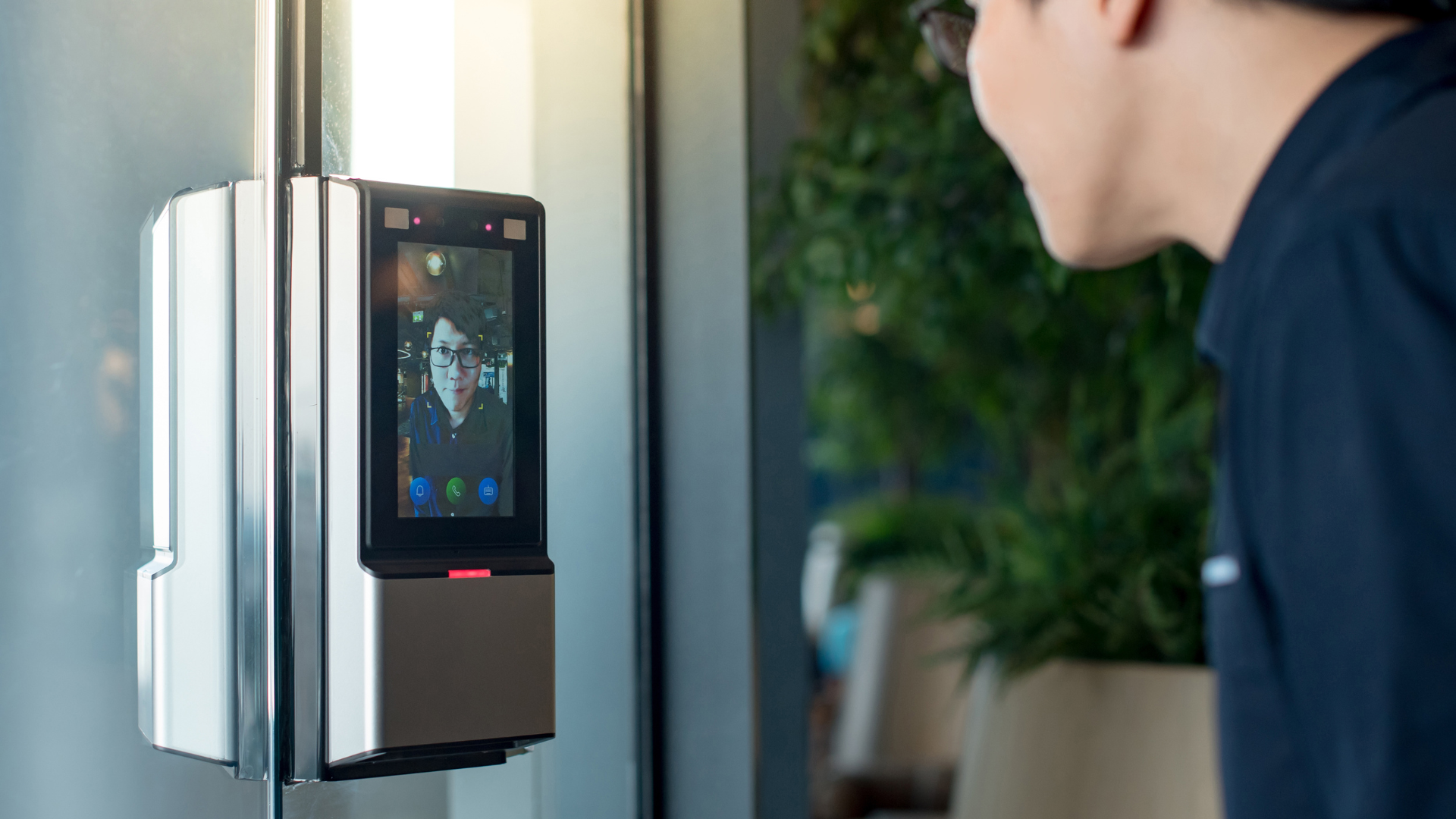 Man Using Facial Recognition Device